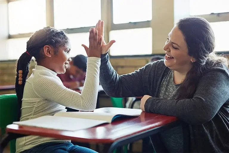 Teacher_student_highfive