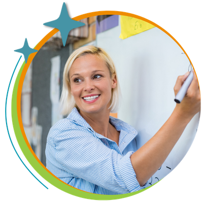 Math teacher at whiteboard 